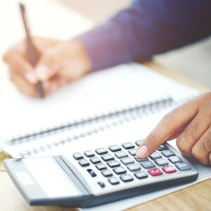 img of someone working on a budget
